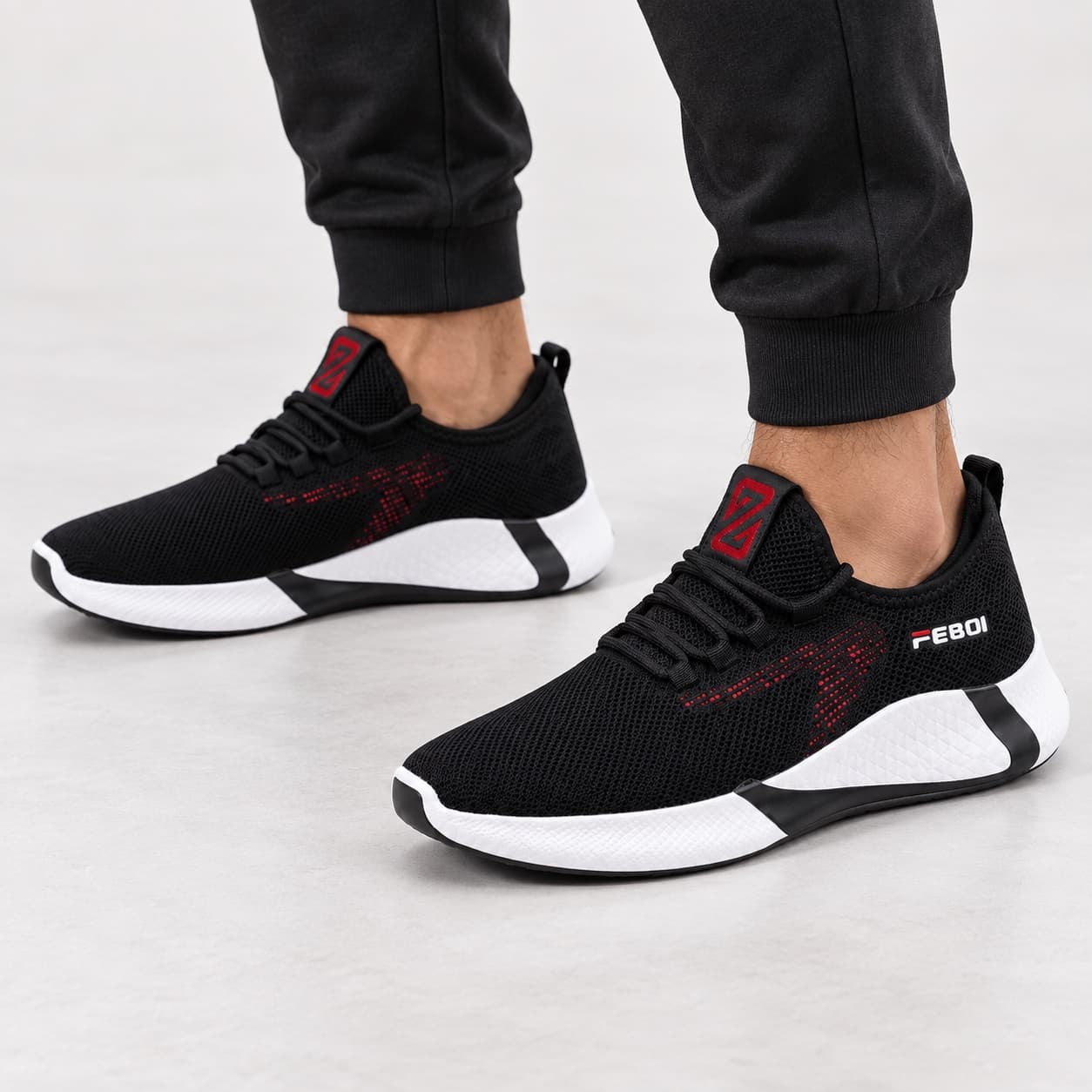 Black and red running shoe — Black